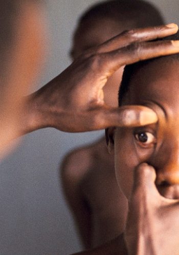 Boy getting his eyes checked